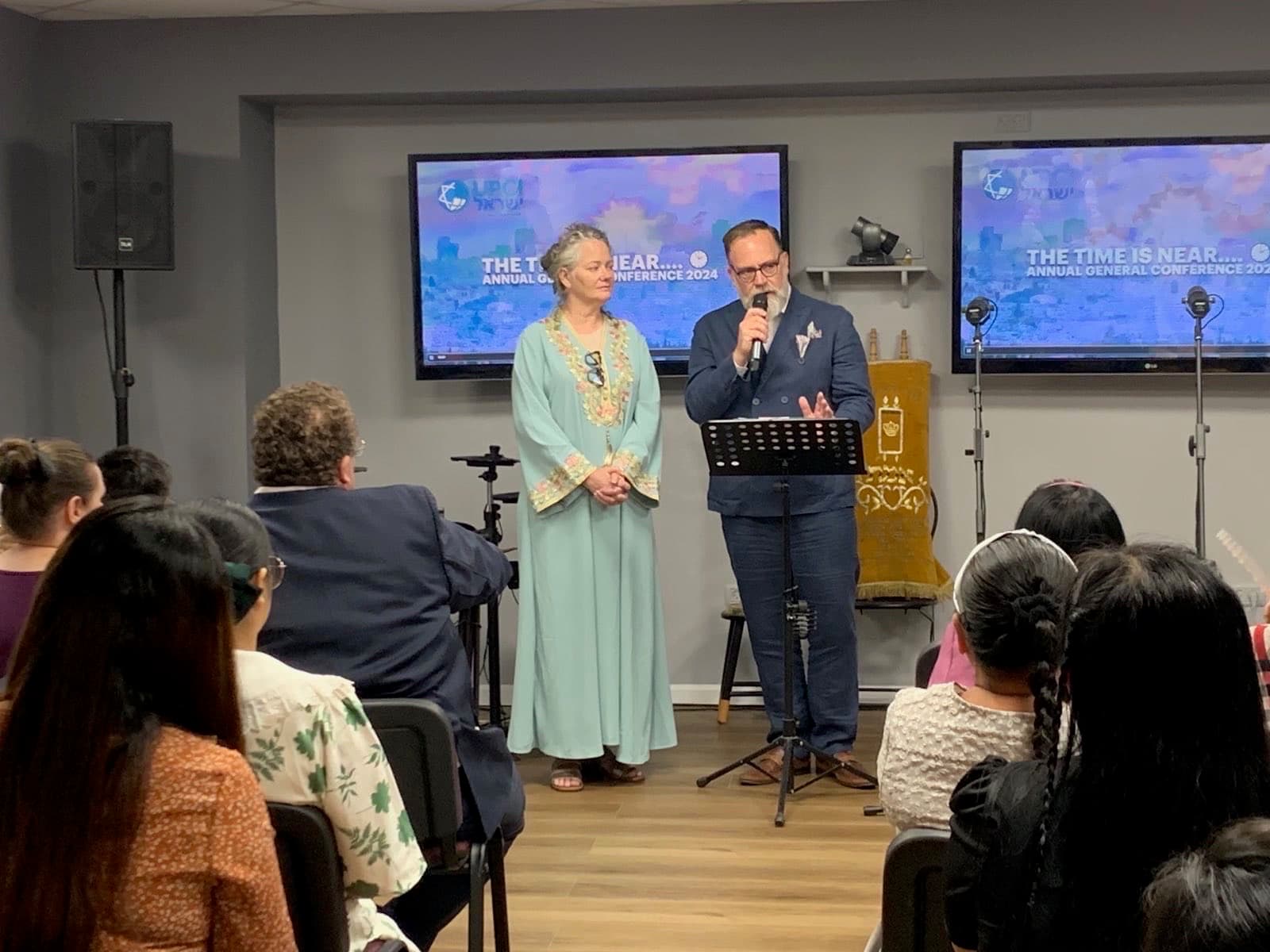 Ministry leaders welcome the congregation at the conference