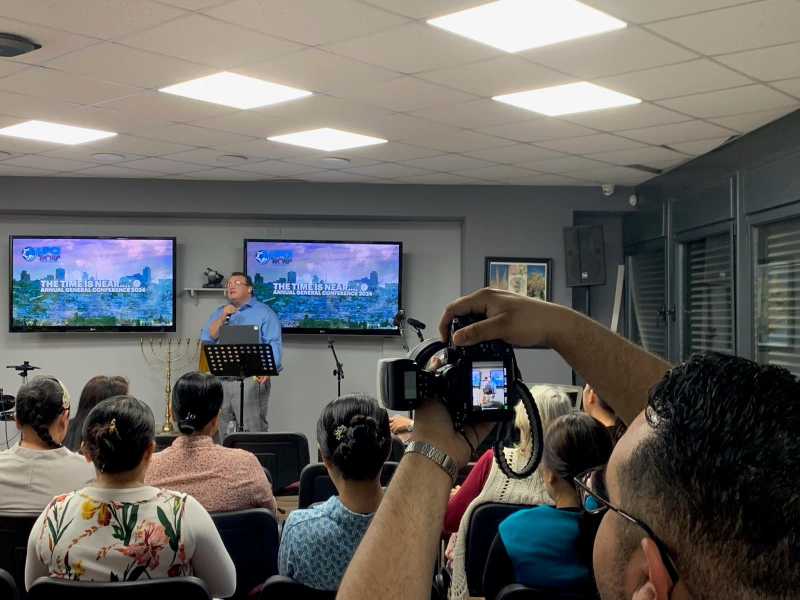The congregation gathered for the conference service