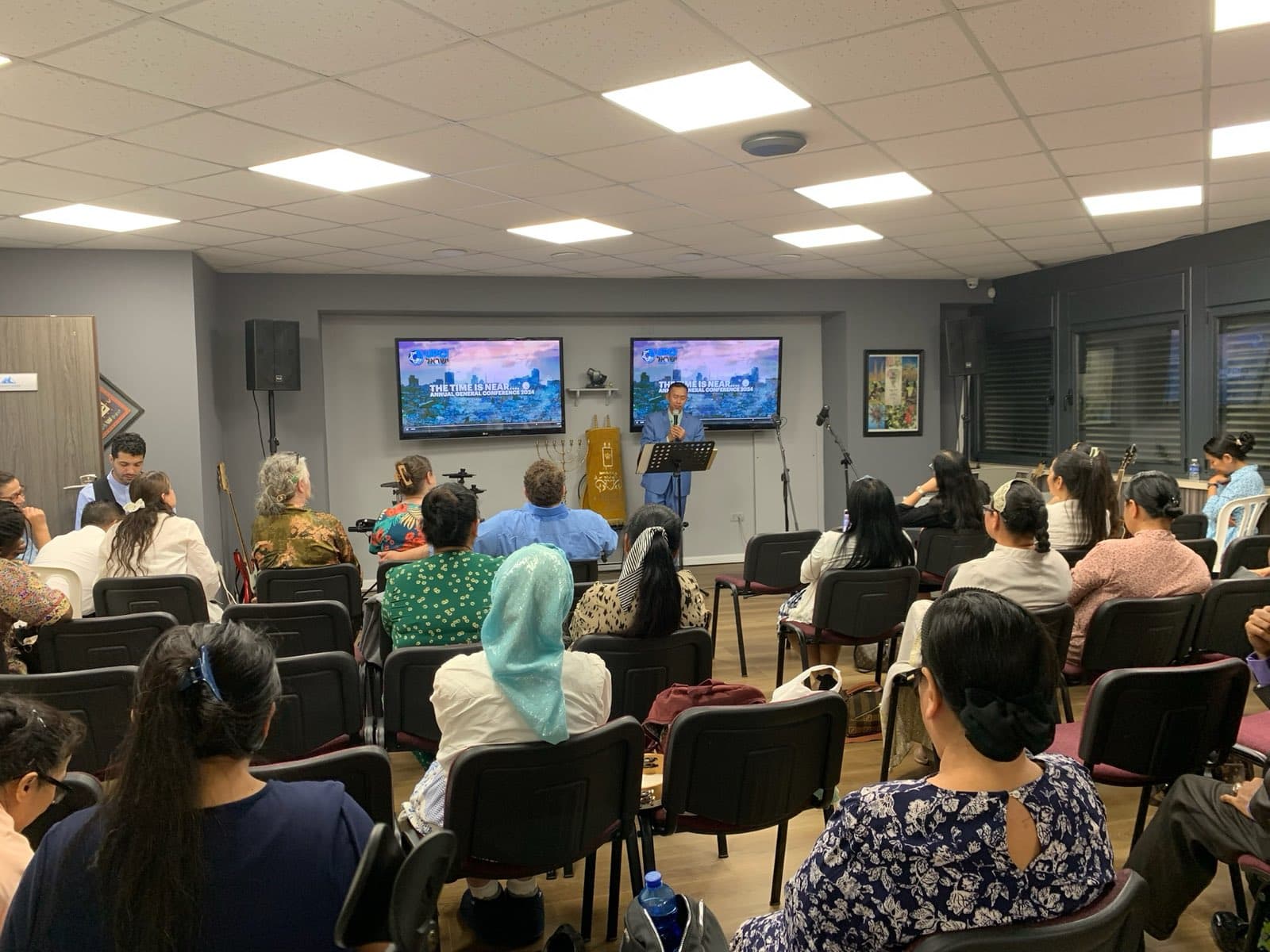 A full room gathered for worship and teaching