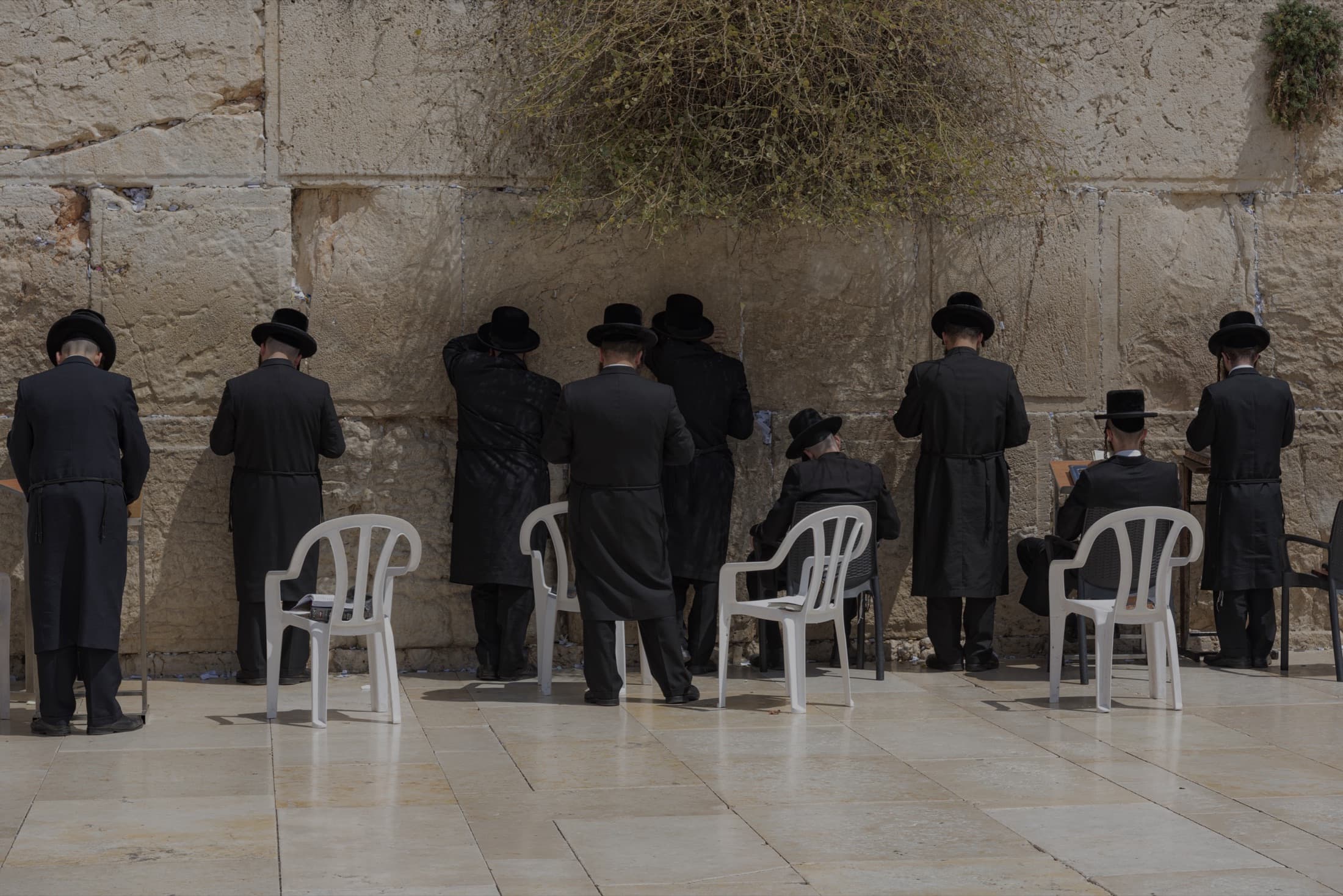 Believers gathered in prayer at the Western Wall